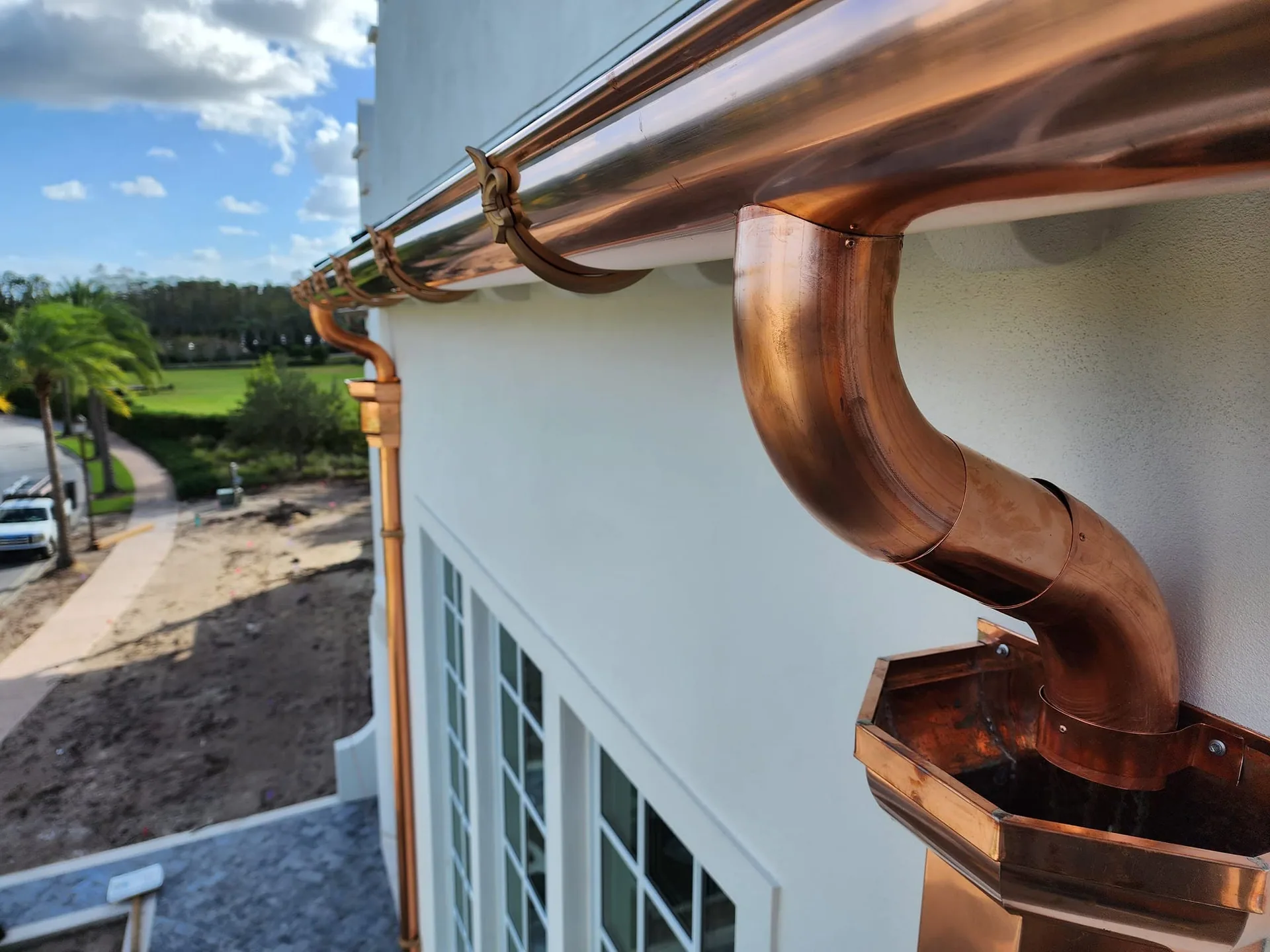 Copper half round gutter elbow conductor head rooftop view, Sanford